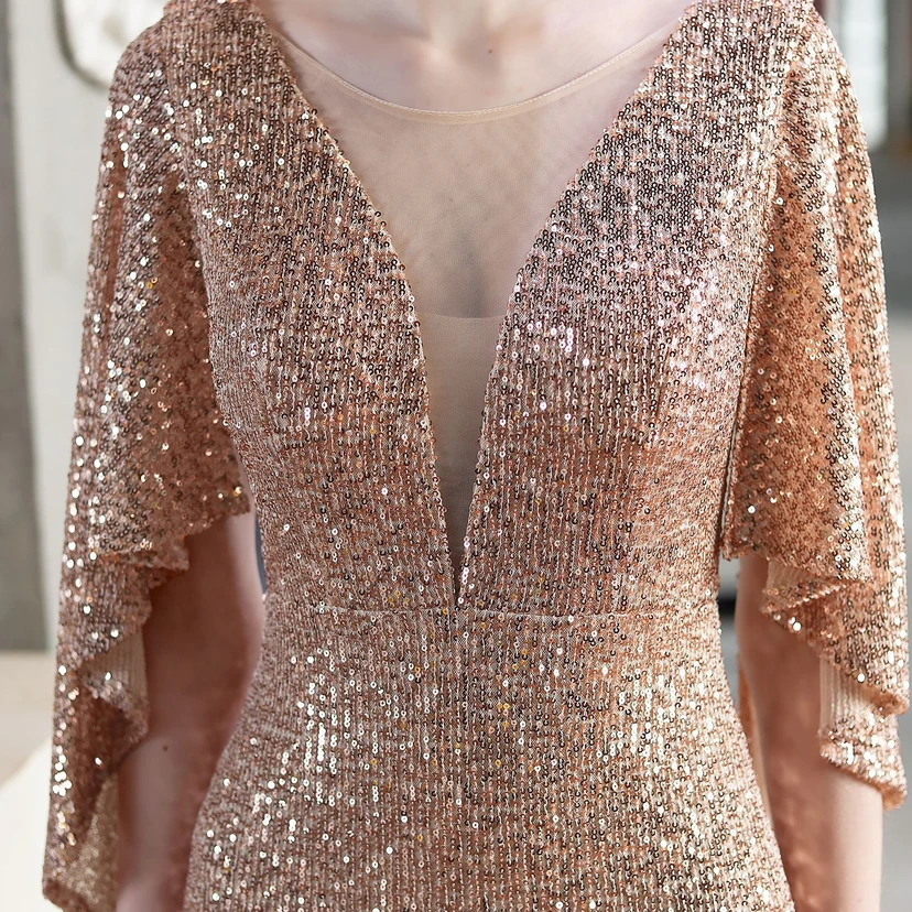 Robe de soirée élégante à paillettes, style sirène, ailes d'ange, idéale pour un banquet ou une réunion. Mannequin automobile. Robe de soirée d'été. view 7