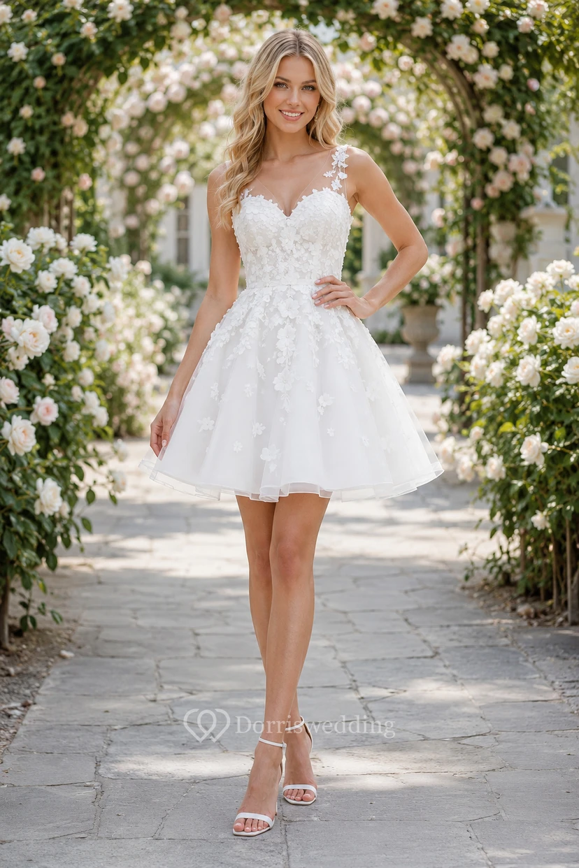 Robe de mariée courte trapèze avec bretelles illusion et application florale