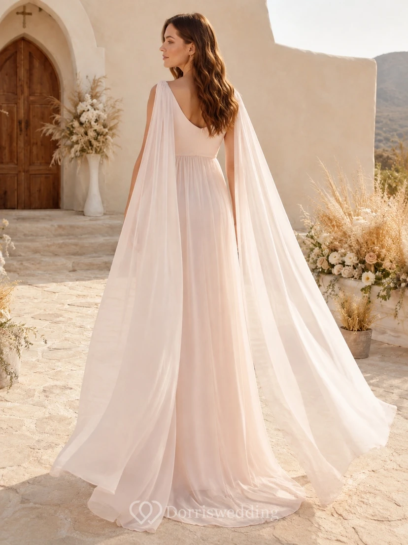 Vestido de novia de maternidad sencillo, estilo imperio, color rosa empolvado, largo hasta el suelo, con capa. view 2