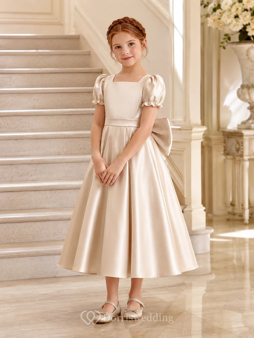 Robe de demoiselle d'honneur champêtre en satin champagne, manches bouffantes, longueur thé, coupe trapèze, avec nœud surdimensionné