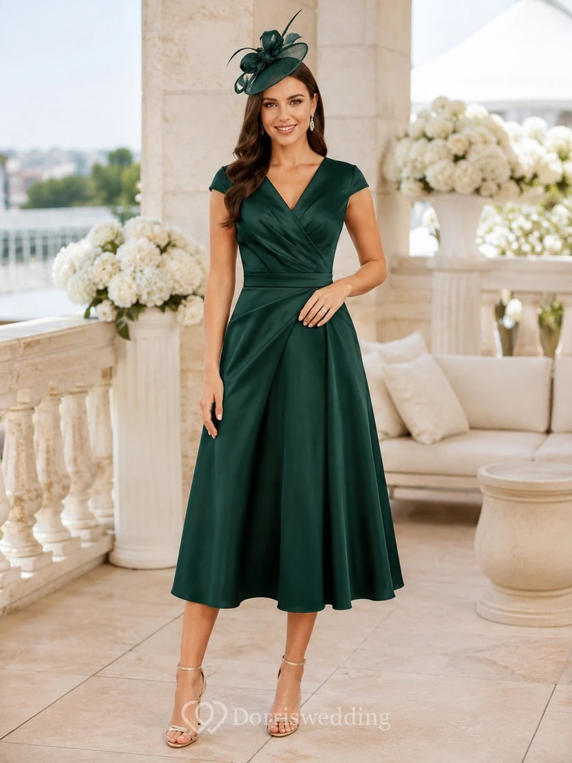 Vestido Derby sin mangas de corte A con escote en V y largo midi, color verde oscuro, de satén.