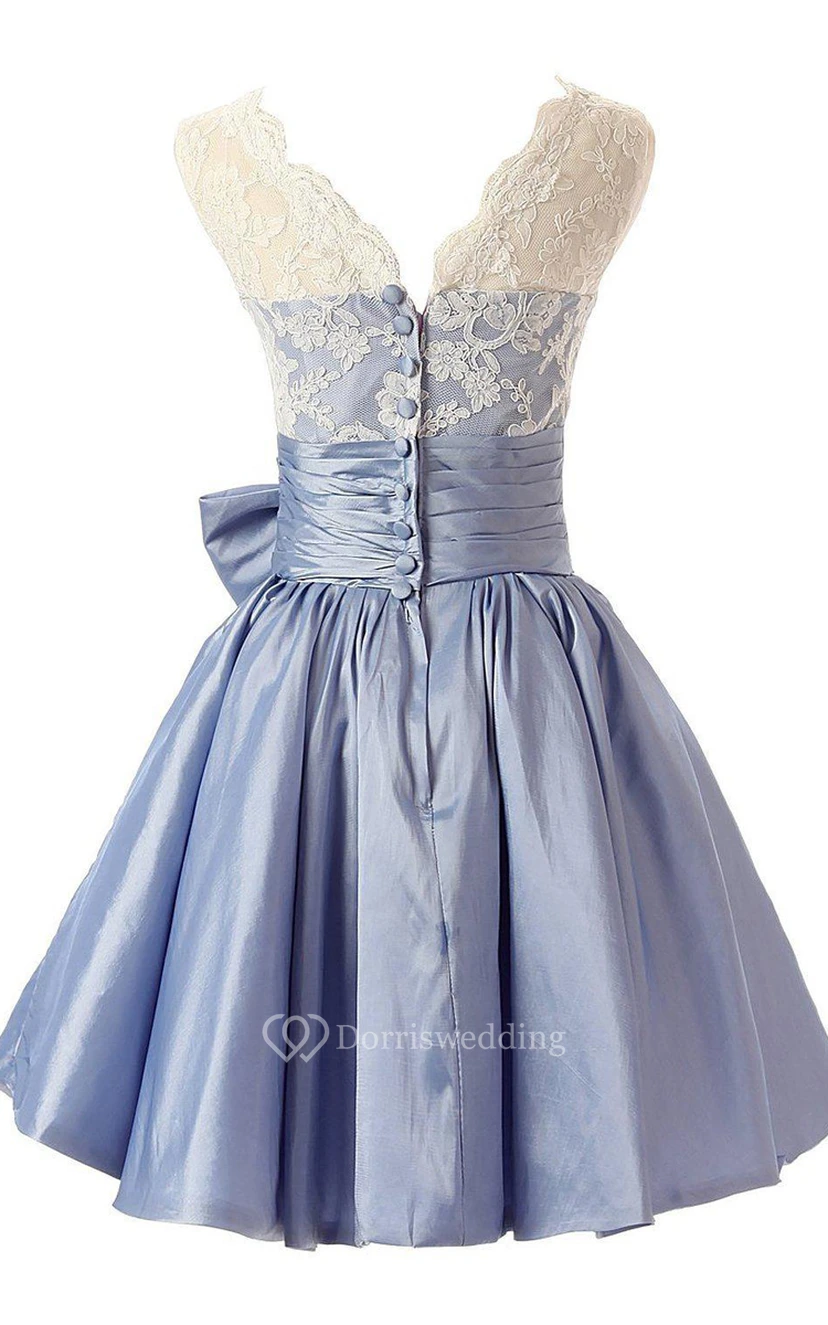 Robe trapèze sans manches avec nœud et corsage en dentelle view 2