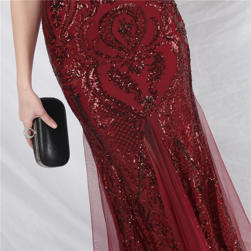 Robe longue haut de gamme en maille à sequins et plumes d'autruche. view 9