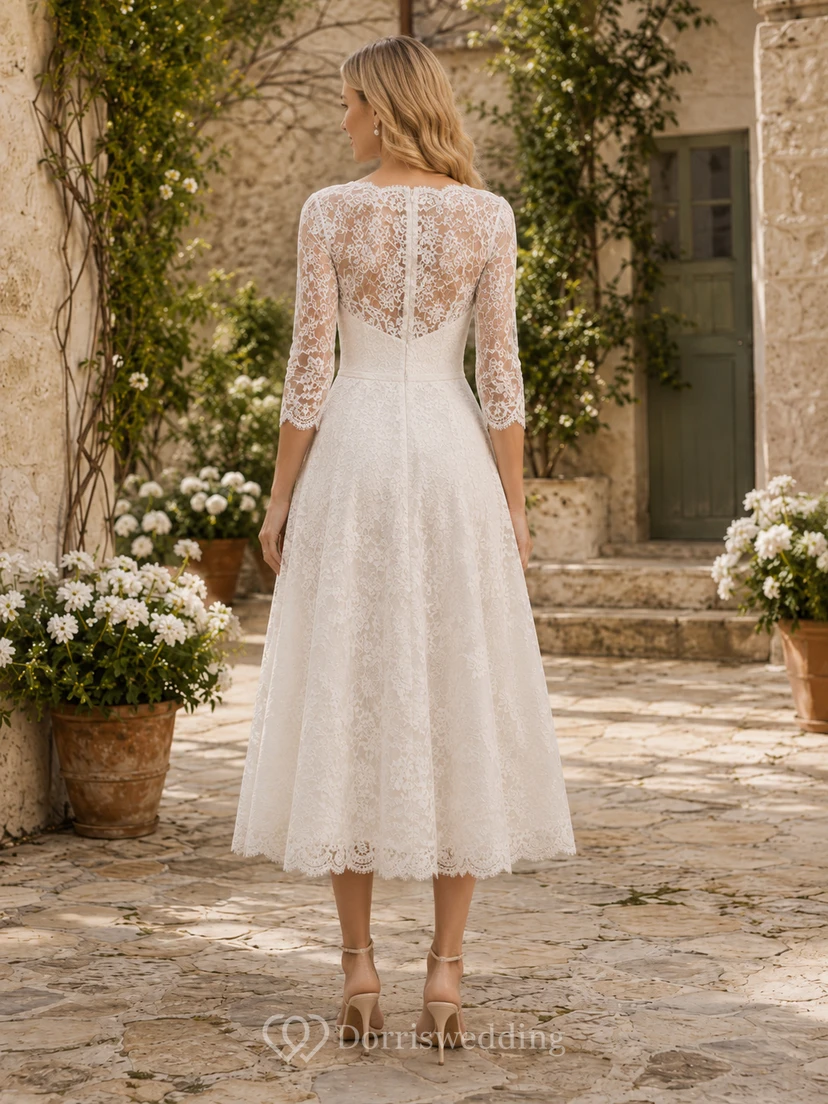 Vestido de novia bohemio de largo midi con escote en V y mangas tres cuartos de encaje, estilo campestre romántico. view 2