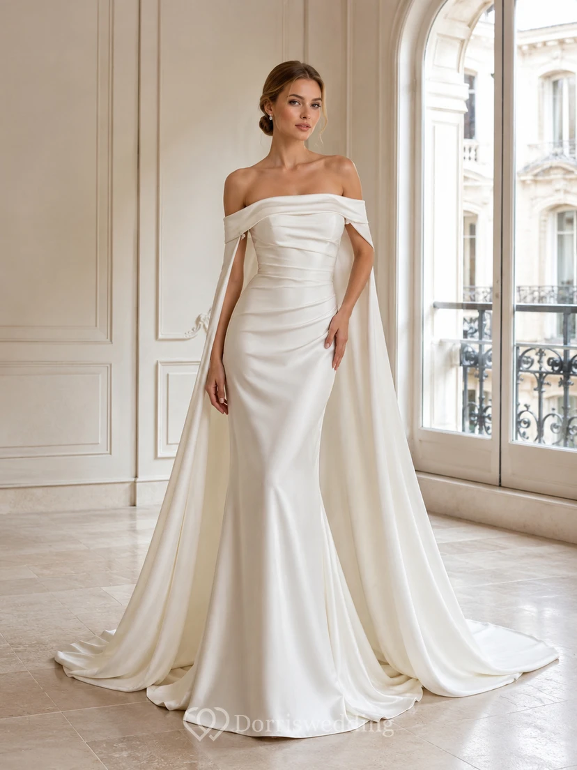 Robe de mariée fourreau en satin à épaules dénudées et manches cape drapées