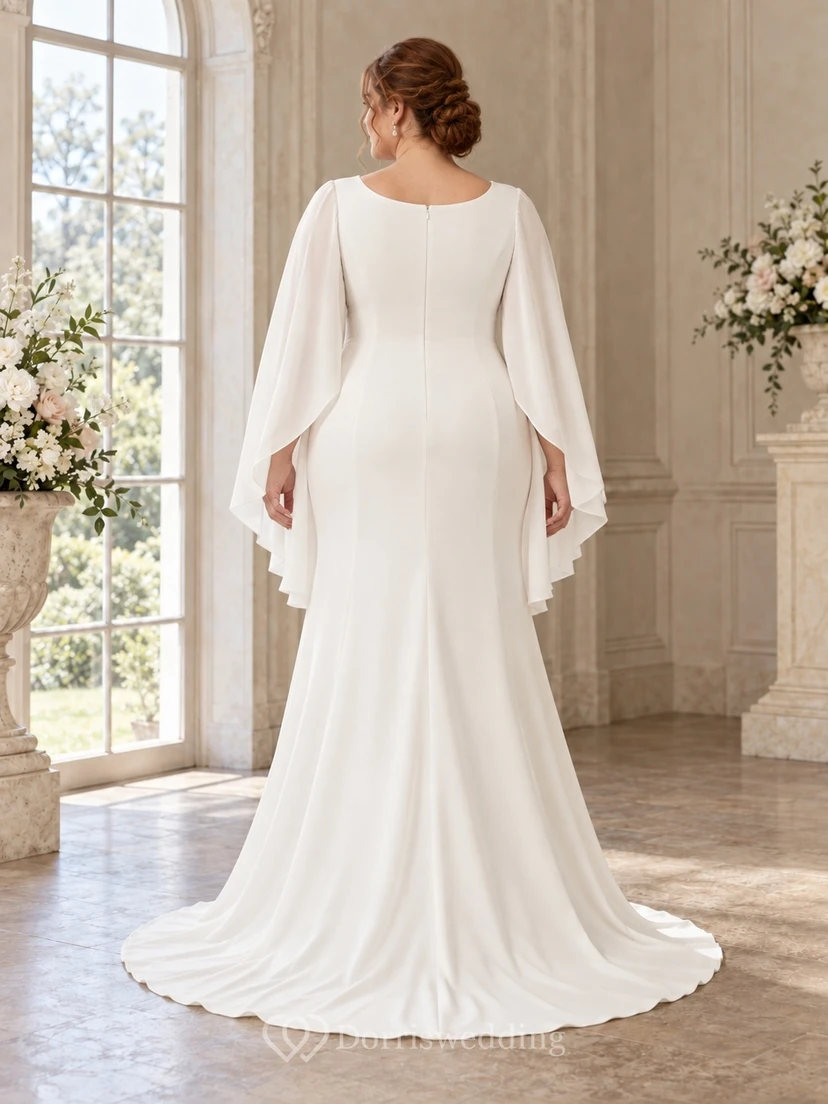 Vestido de novia de corte recto con escote redondo discreto, mangas largas tipo capa y cola larga. view 2