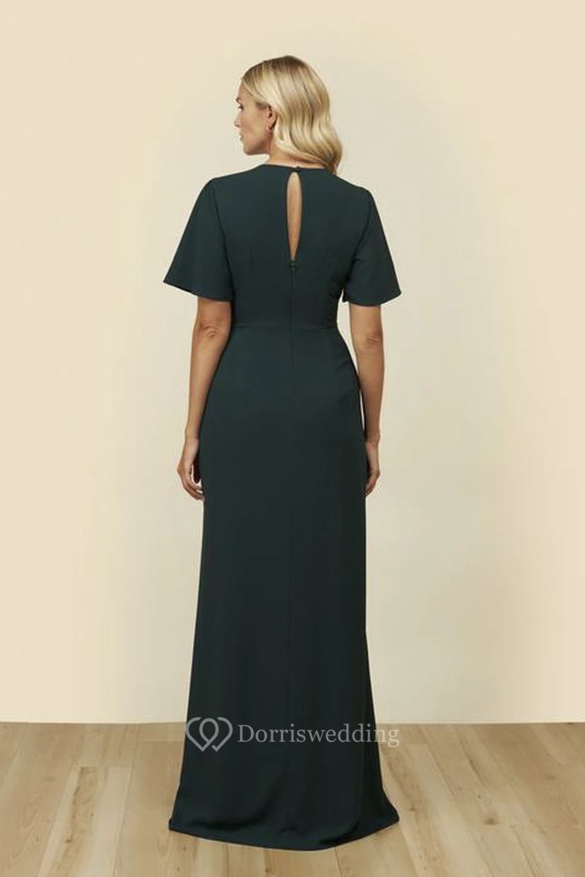 Robe fendue sur le devant, manches cloche mi-longues, dos nu en forme de goutte et décolleté plongeant view 2