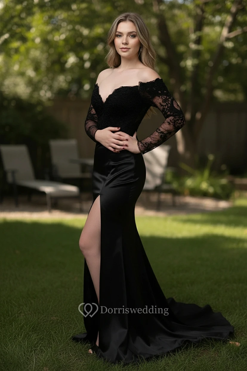 Vestido negro de encaje con hombros descubiertos y abertura alta. view 3