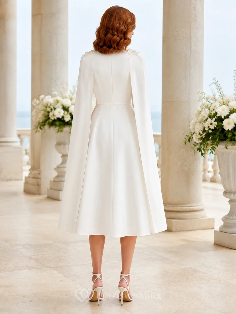 Vestido de novia de satén con escote en V, manga larga y capa, largo hasta la rodilla view 2