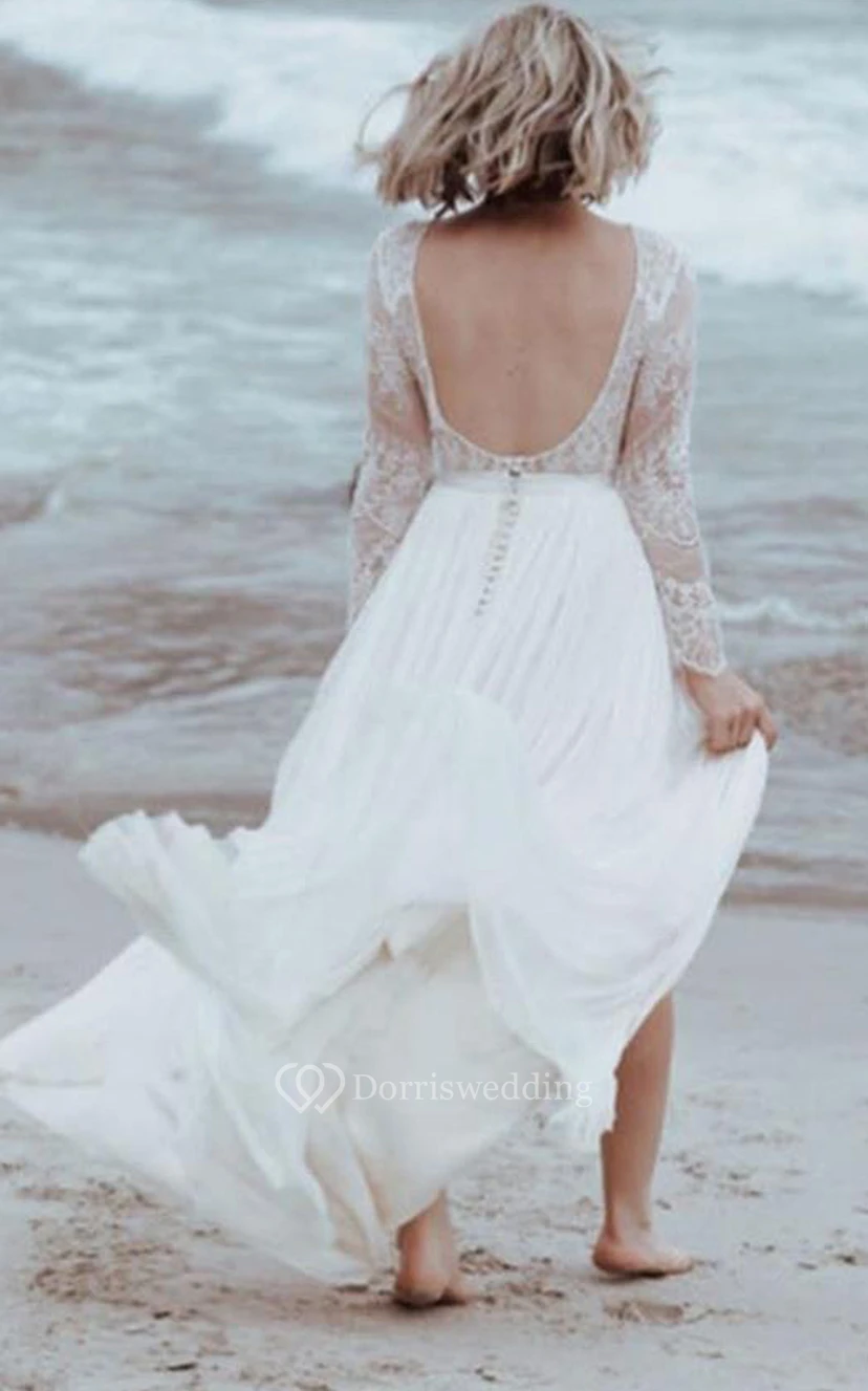 Robe de mariée simple en tulle et dentelle, coupe trapèze, longueur au sol, manches longues, fente sur le devant et plis view 4