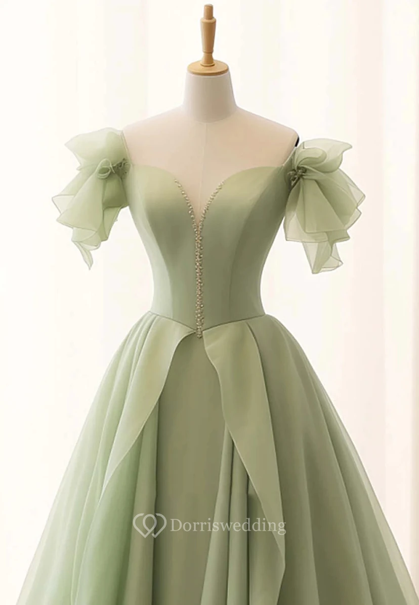 Robe de soirée vert clair à épaules dénudées et nœud view 4