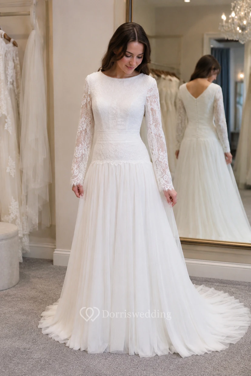Robe de mariée modeste à manches longues et taille basse, coupe trapèze, en tulle avec superposition de dentelle et plis view 6