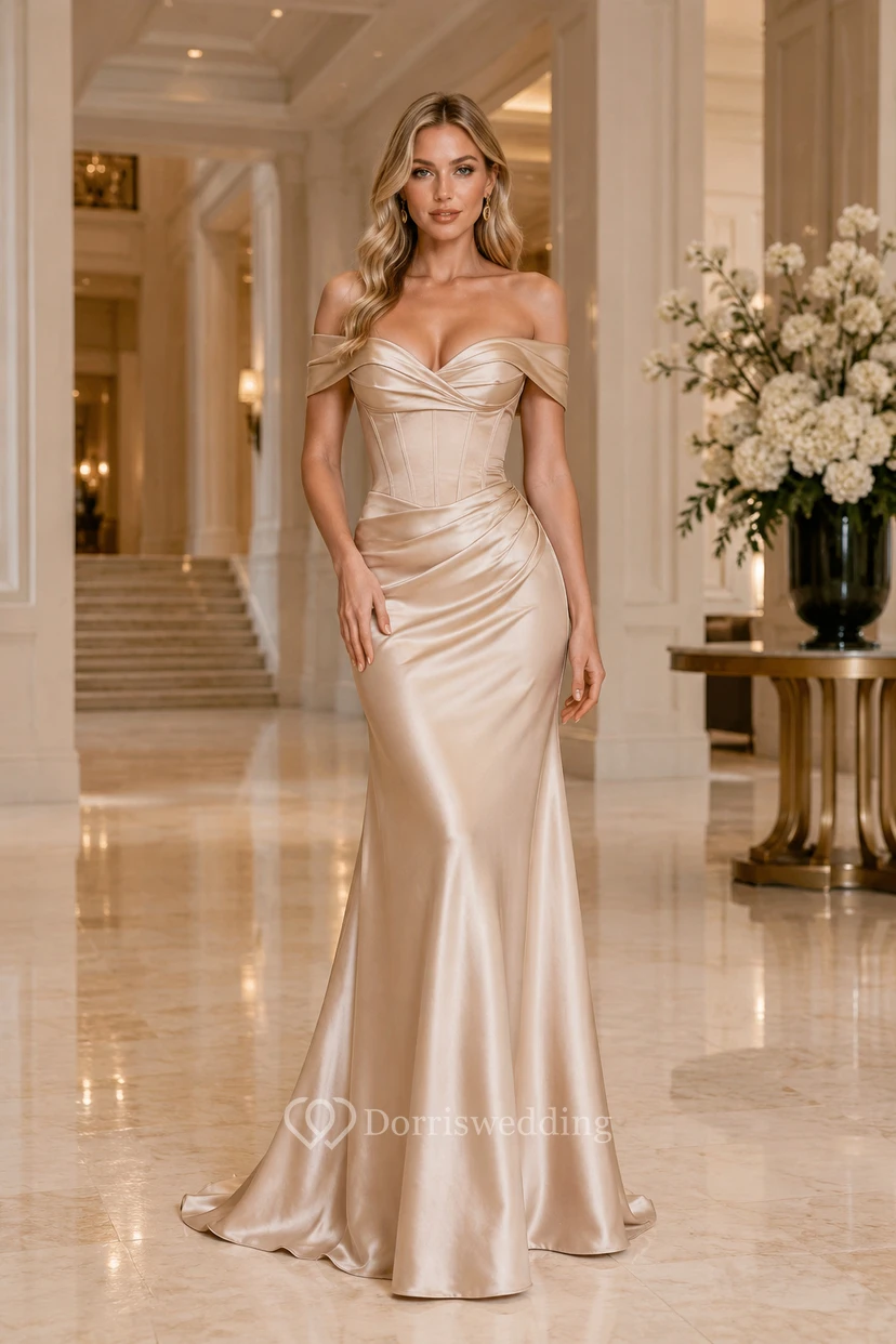 Vestido formal de satén color champán con escote Bardot, corte sirena, corpiño tipo corsé y falda fruncida.