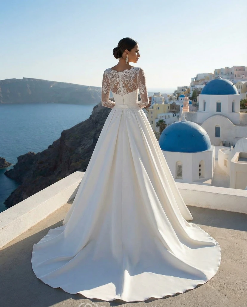 Vestido de novia de satén estilo princesa con mangas largas de encaje y cola catedral. view 2