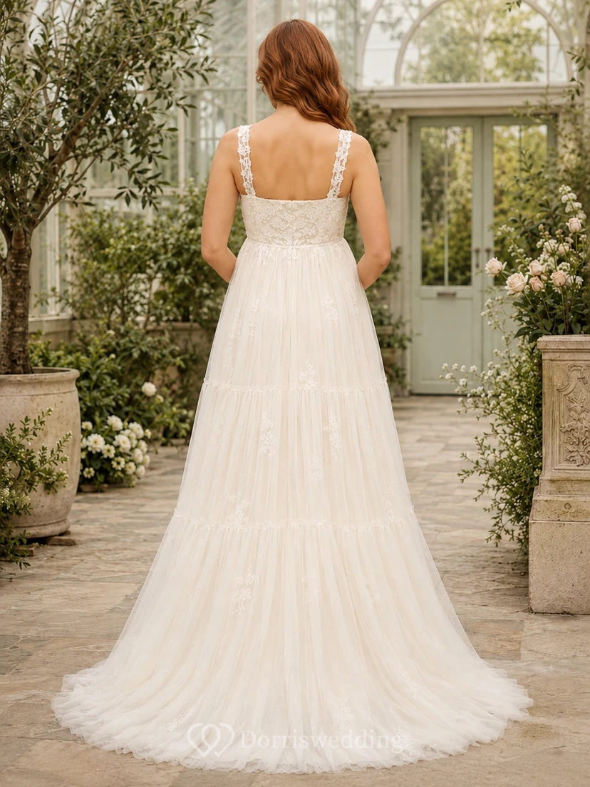 Robe de mariée longue sans manches en mousseline et dentelle, coupe empire, col en V, idéale pour la plage. view 2