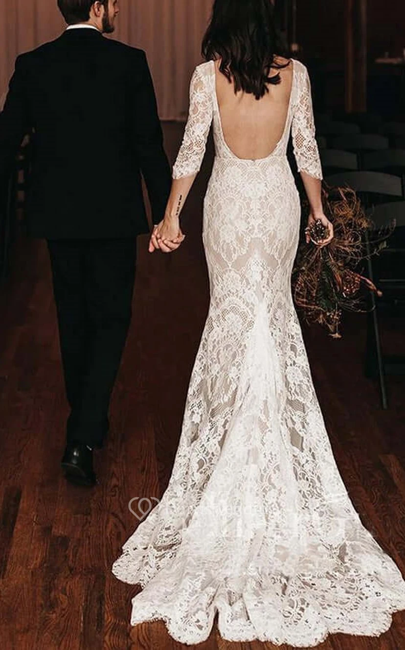 Robe de mariée vintage bohème fourreau en dentelle à col en V, manches 3-4, ornée d'appliqués et d'une traîne courte. view 2