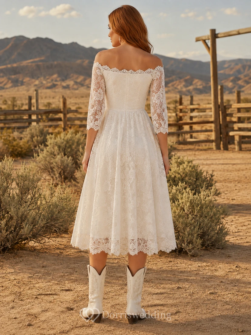 Robe de mariée champêtre vintage en dentelle, épaules dénudées, manches trois-quarts, longueur thé, style western rustique. view 2