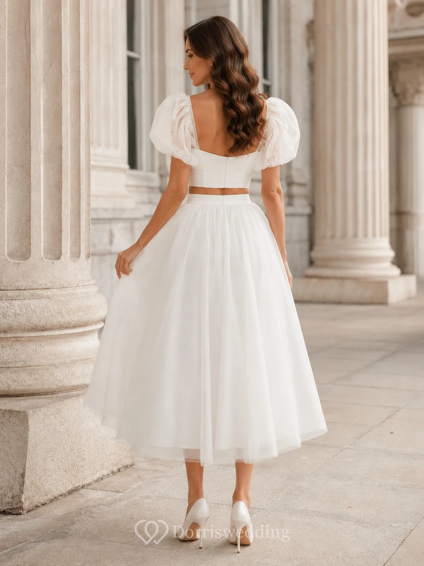 Conjunto de novia de tul largo hasta la rodilla con top corto abullonado y escote corazón. view 2