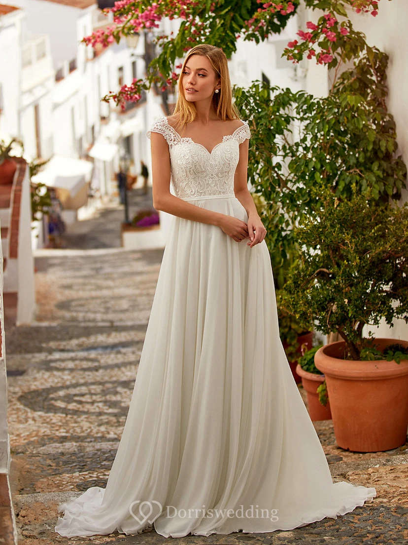 Robe de mariée empire plissée en mousseline de soie avec haut en dentelle