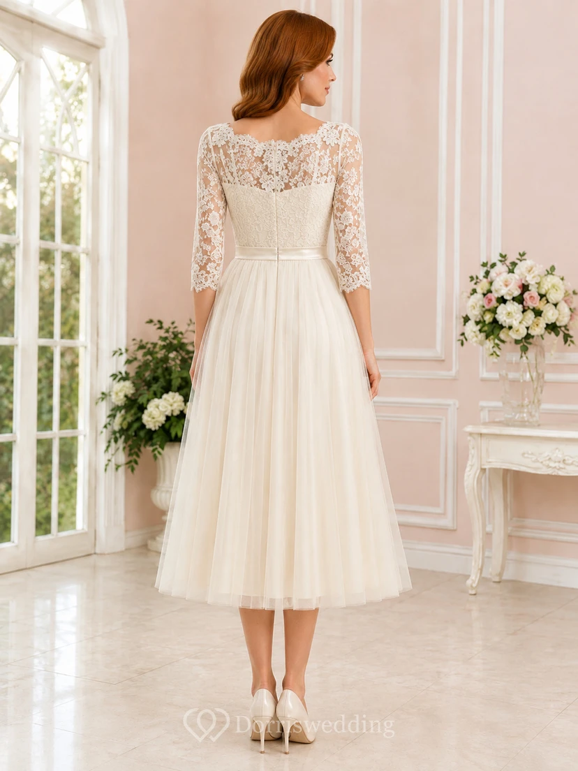 Vestido de cóctel de boda vintage con escote joya, efecto ilusión, mangas tres cuartos, encaje, corte en A y largo hasta la rodilla view 2