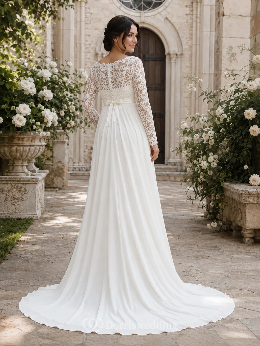 Elegante vestido de novia premamá con escote joya, mangas largas, encaje y cola de imperio. view 2