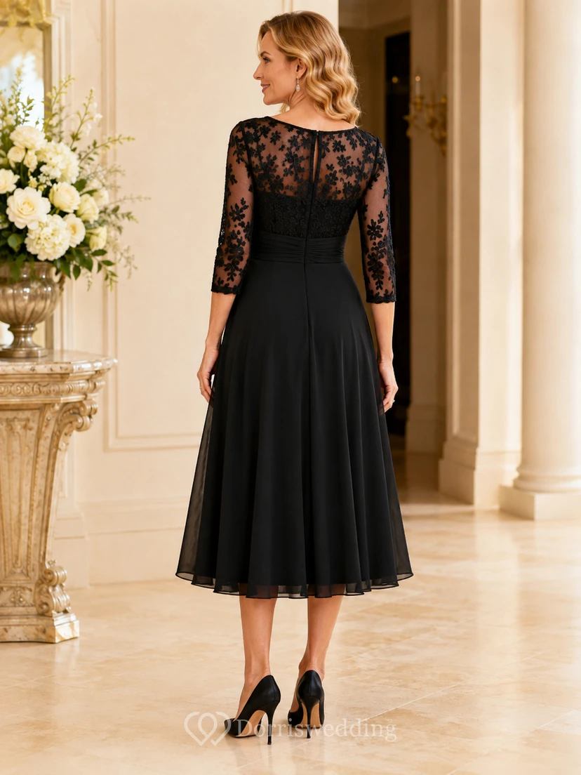 Elegante vestido negro de gasa con encaje y escote barco de tres cuartos hasta la rodilla para madres. view 2