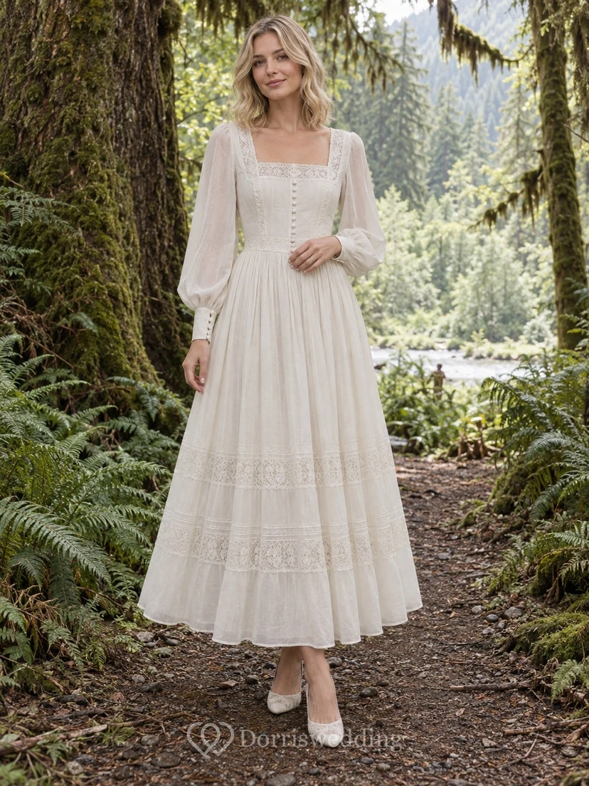 Vestido de novia vintage de corte A con mangas largas, cuello cuadrado y volantes, largo hasta la rodilla, de voile de algodón.