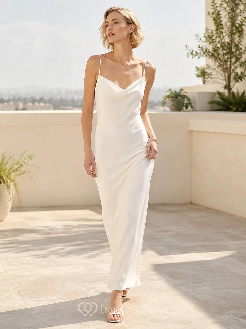 Robe de mariée moderne à bretelles spaghetti en satin drapé, dos nu et longueur cheville, idéale pour une réception.