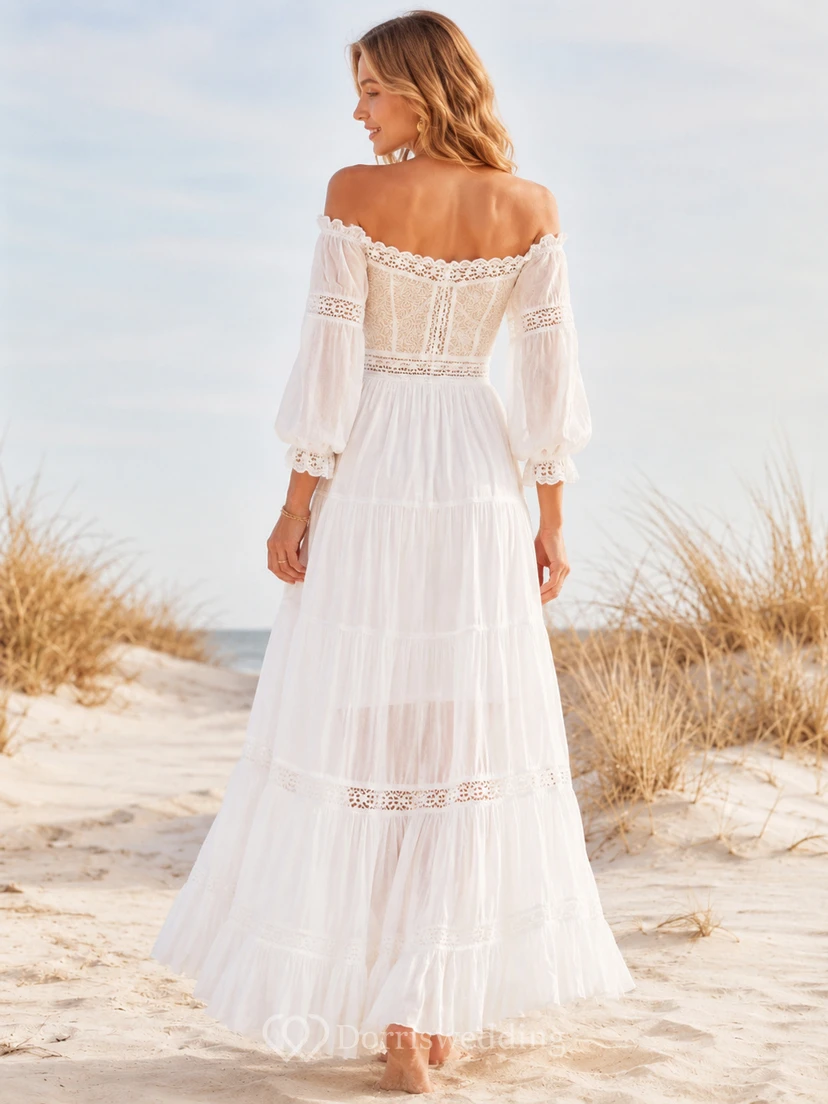 Robe de mariée bohème de plage en mousseline de soie à épaules dénudées, manches bouffantes et volants. view 2