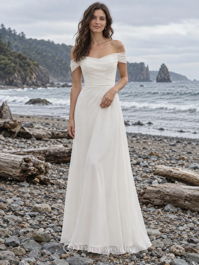 Vestido de novia sencillo de gasa con escote Bardot, corte en A, corpiño fruncido y falda larga hasta el suelo.