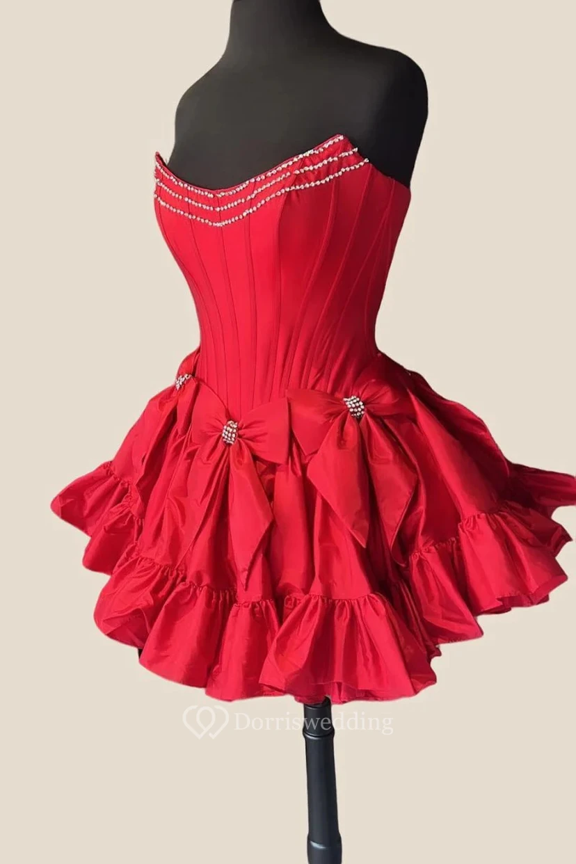 Vestido magenta sin tirantes con lazo y abalorios. view 14
