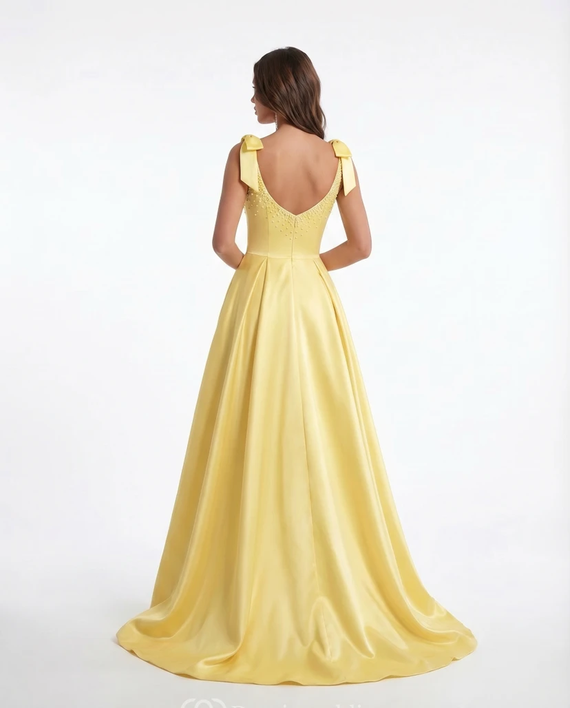 Robe de bal trapèze en satin jonquille avec bretelles à nœud et corsage perlé view 2