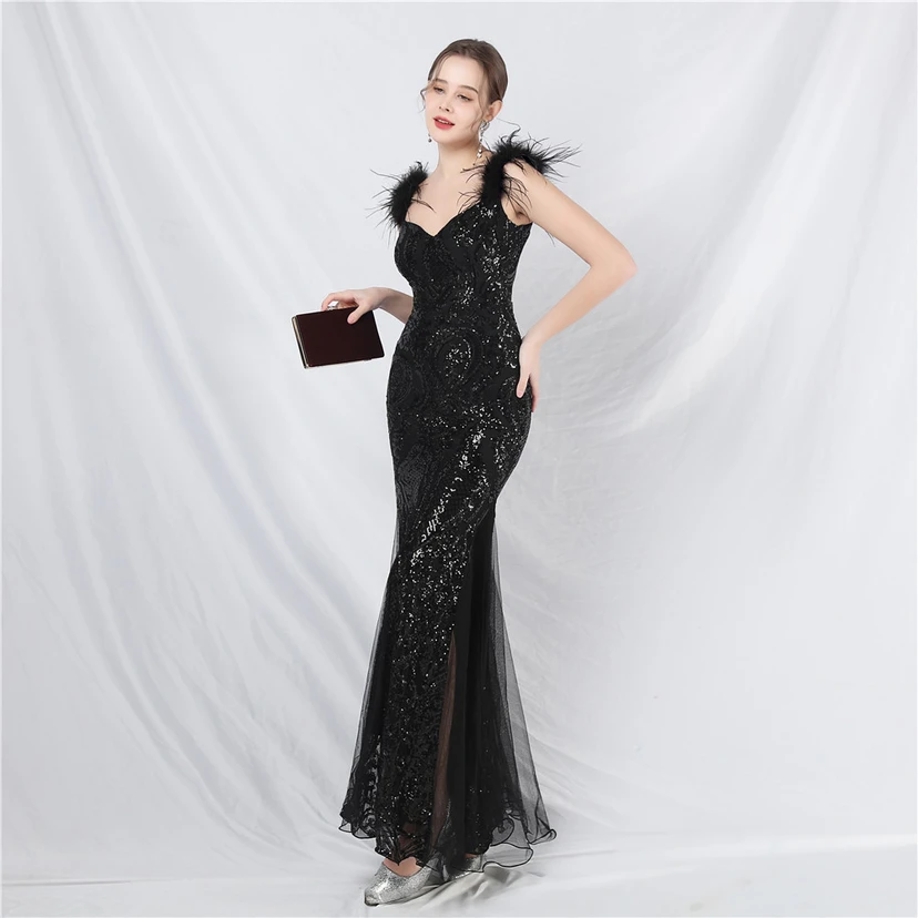 Robe longue haut de gamme en maille à sequins et plumes d'autruche. view 23