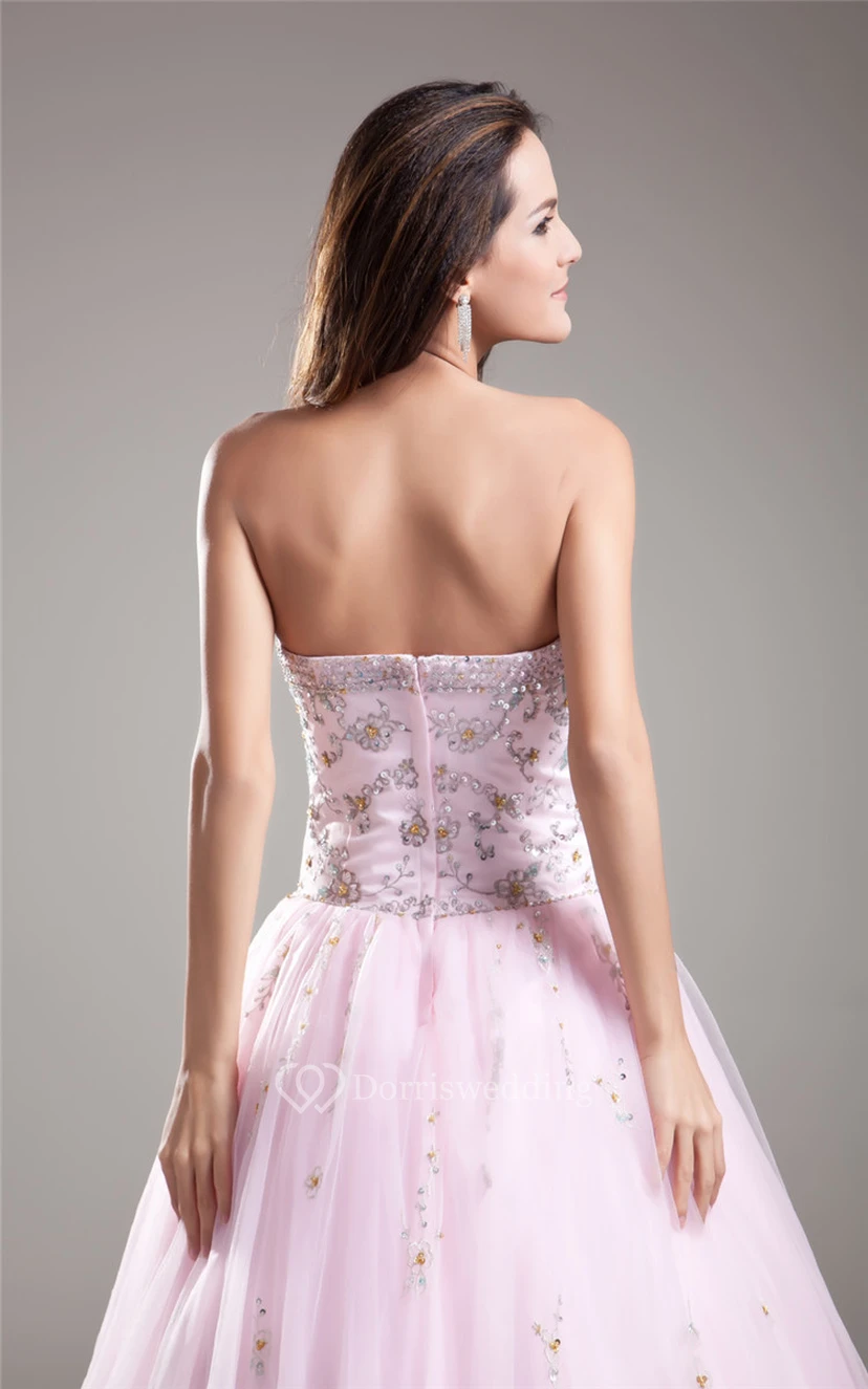 Blushing Strapless Beaded Ball Gown With Tulle Overlay view 7