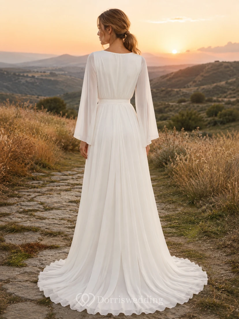 Robe de mariée en mousseline à manches longues cloche et portefeuille pour une escapade romantique à la campagne view 2