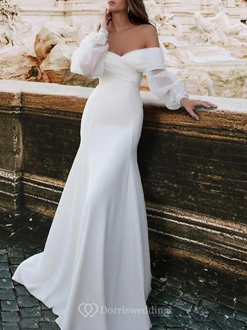 Robe de mariée bustier évasée à manches transparentes