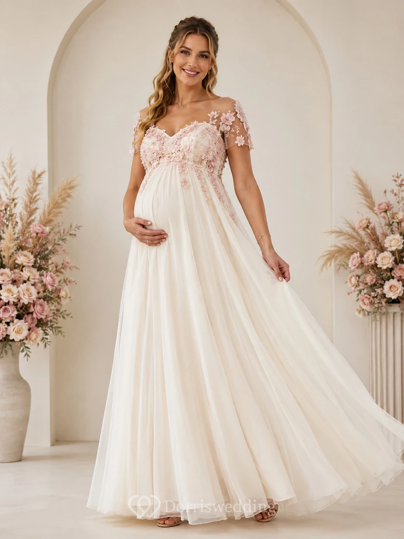 Robe de cérémonie en tulle ivoire à effet floral appliqué, idéale pour une baby shower de bébé fille.