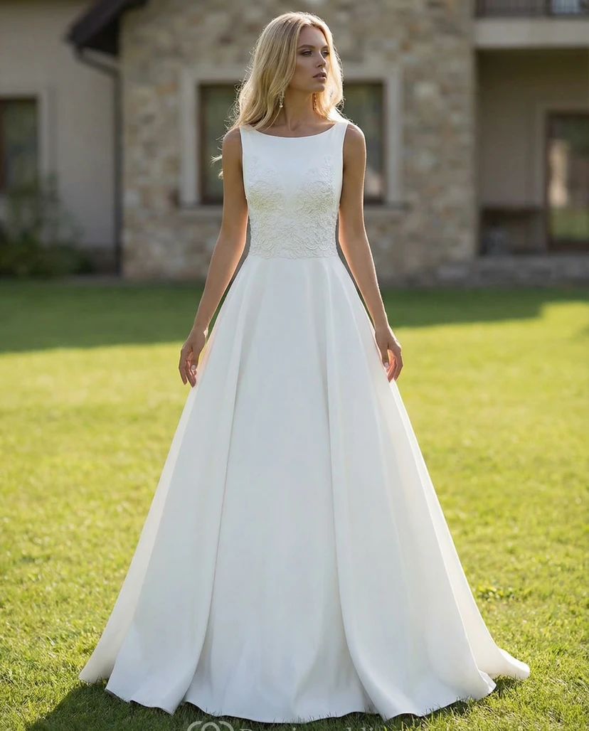 Vestido de novia de satén con escote barco y apliques