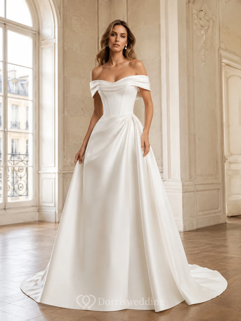 Robe de mariée en satin à épaules dénudées et décolleté cœur, coupe trapèze plissée, traîne courte