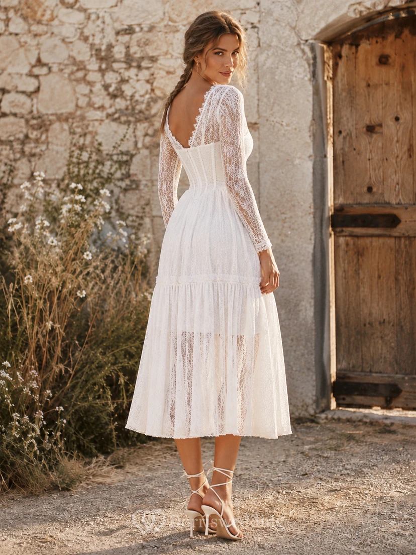 Vestido blanco de corte A largo midi con escote corazón, mangas acampanadas y encaje, estilo bohemio. view 2