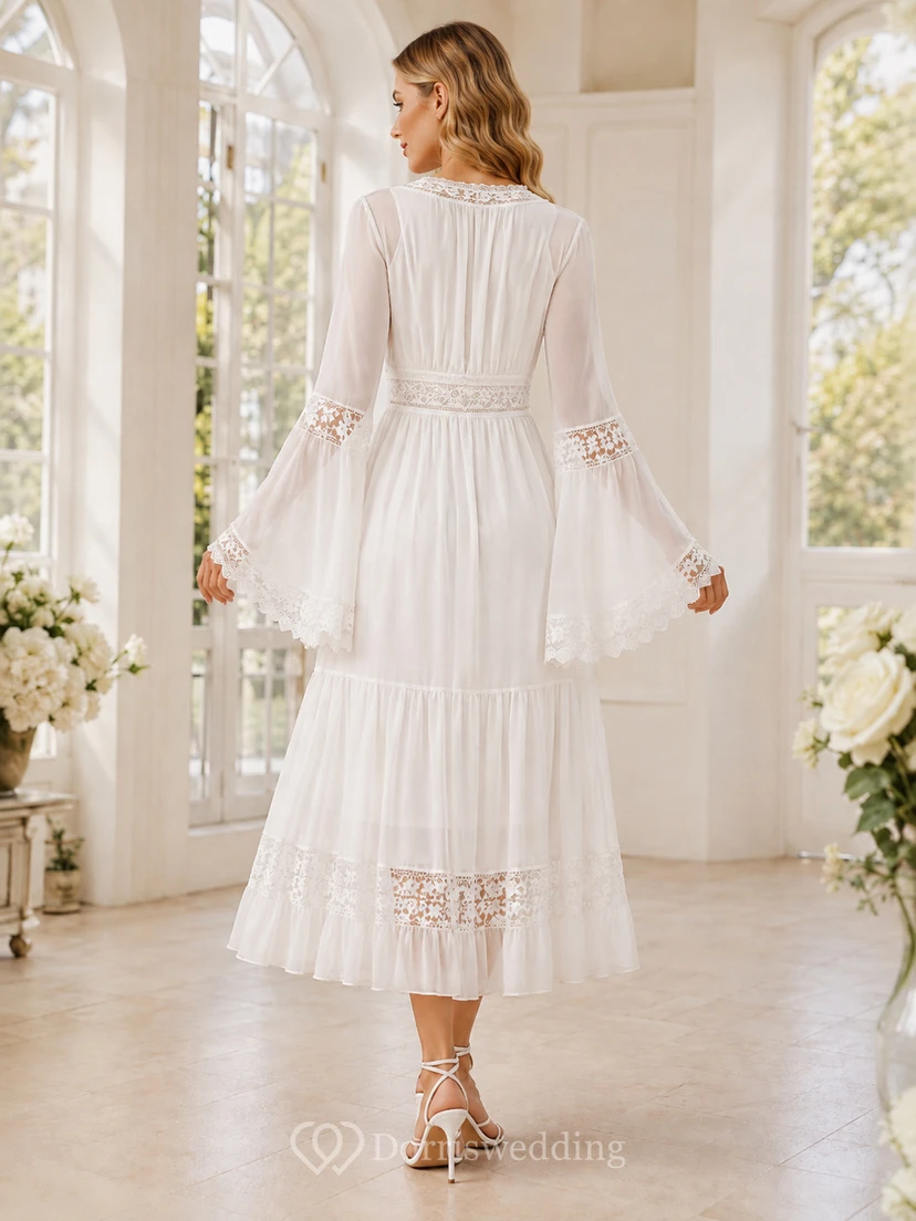 Robe de mariée bohème en mousseline de soie, col en V, manches cloche, coupe trapèze, longueur cheville, style jardin. view 2