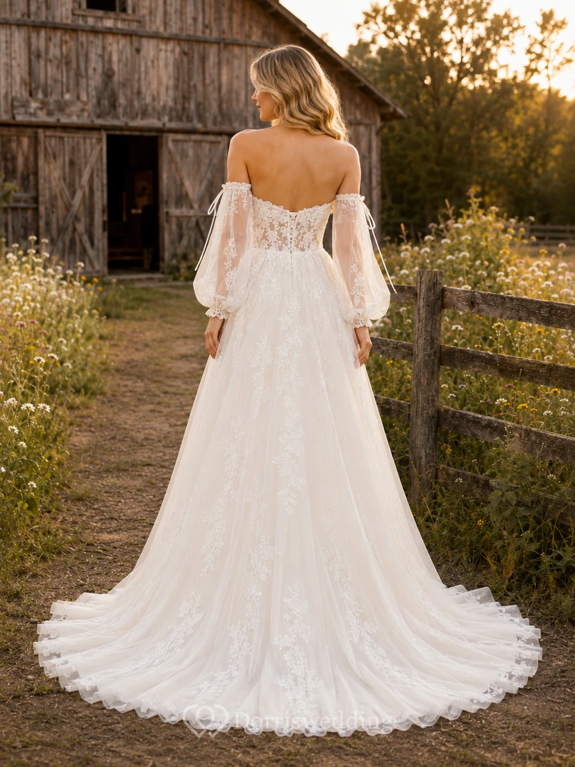 Robe de mariée champêtre en tulle et dentelle, coupe trapèze, épaules dénudées, manches longues, traîne chapelle view 2