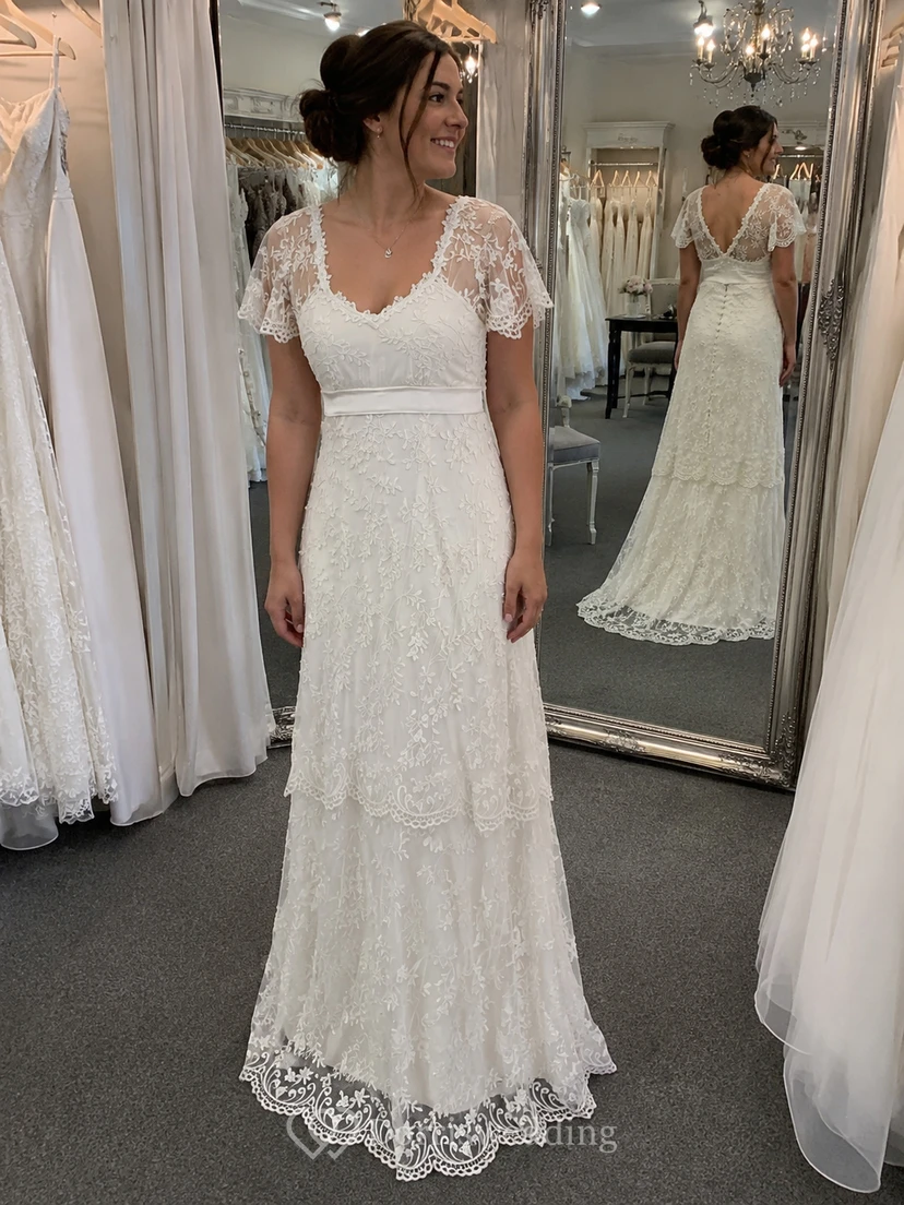 Vestido tubo con espalda y mangas transparentes. view 5