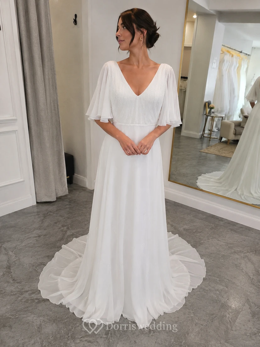 Vestido de novia de gasa con escote en V y mangas tres cuartos, estilo imperio. view 6