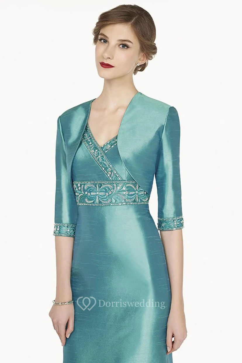 Robe de bal mi-longue en satin à manches courtes et col en V, ornée de cristaux et d'une taille empire, avec veste assortie. view 2