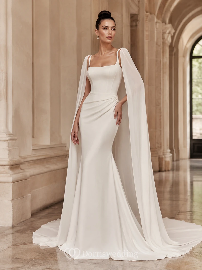 Robe de mariée moderne en satin à traîne chapelle, coupe carrée et élégante, style fourreau, avec traîne chapelle et une allure romantique raffinée.