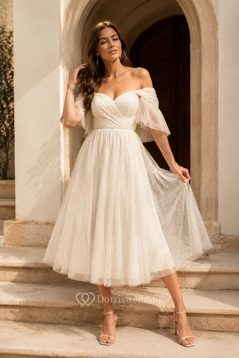 Robe de mariée en tulle mi-longue à épaules dénudées et manches bouffantes