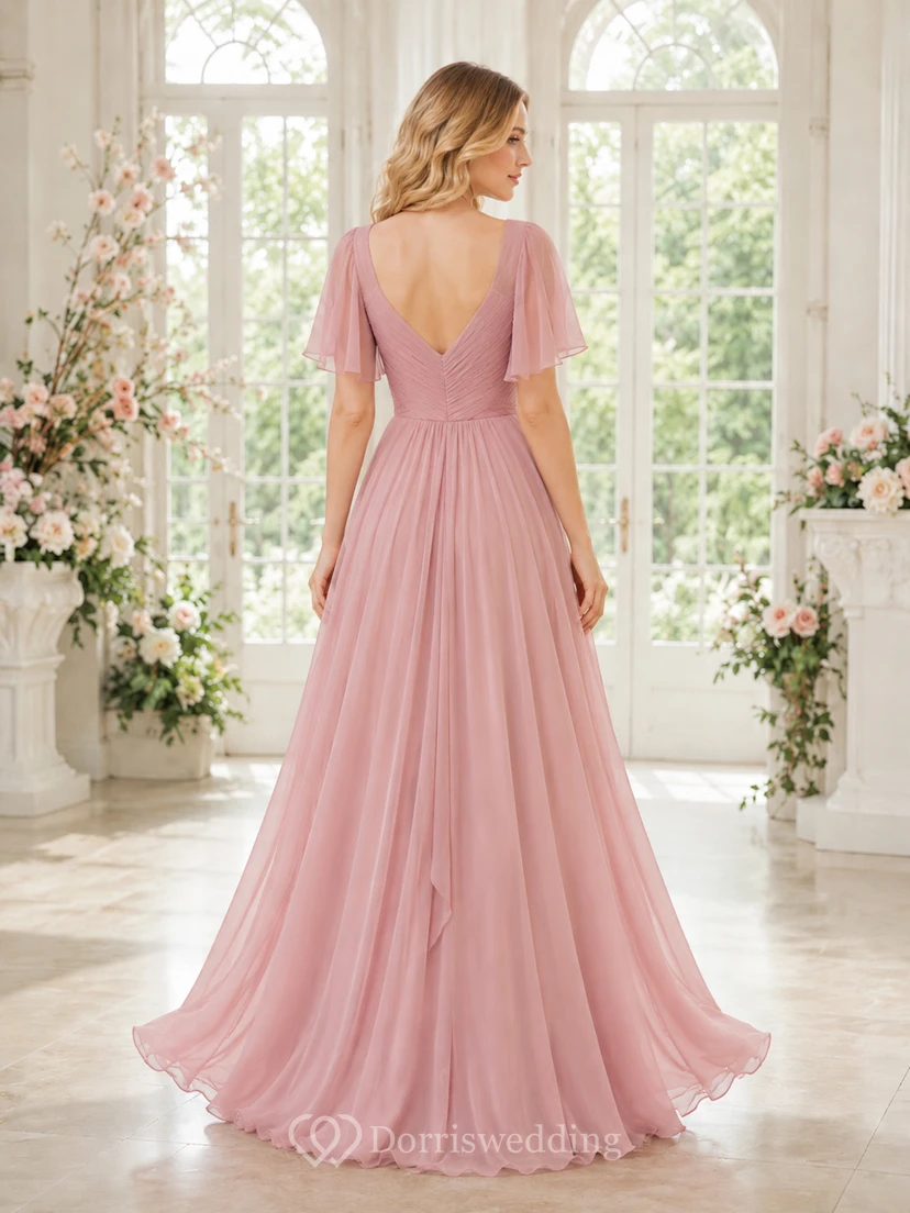 Vestido romántico de tul color rosa empolvado con mangas de volantes y corte en A. view 2