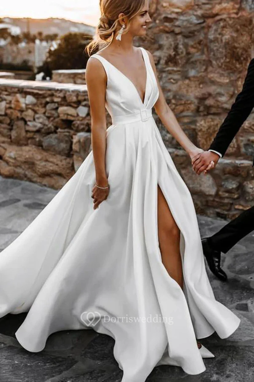 Elegante vestido de novia de gasa con escote en V y abertura frontal, a la moda y muy sexy.