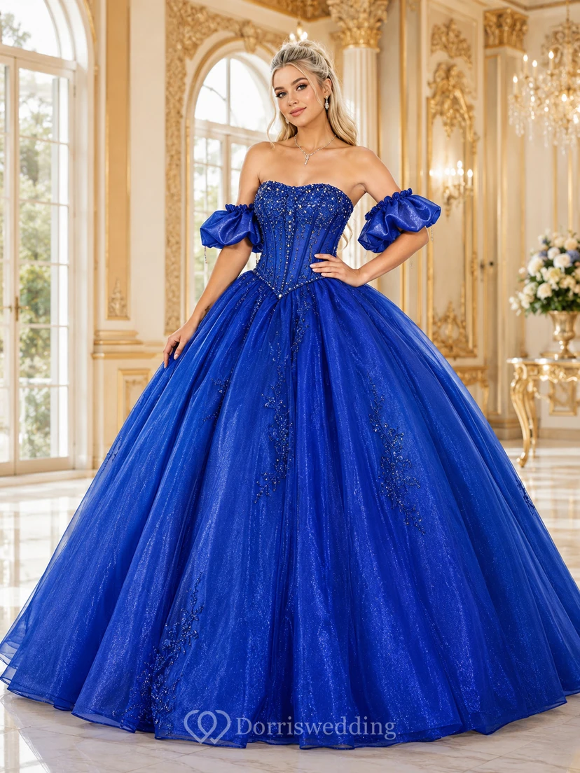 Vestido de quinceañera de lujo azul rey con hombros descubiertos, mangas abullonadas, corsé de tul con cuentas y vestido de gala de tul